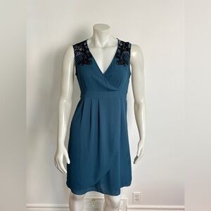 NWT - MEXX Metropolitan. Teal faux-wrap dress with black crochet lace detail. 6